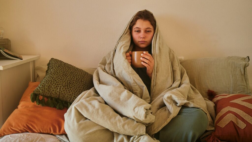 woman cold at home